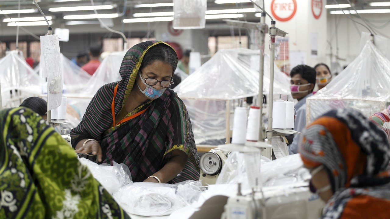 A garment worker in Bangladesh, where textiles are a major export item. Image: Flickr